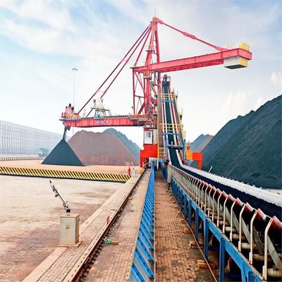 Sistema do empilhador e do Reclaimer da roda da cubeta para o curral longitudinal